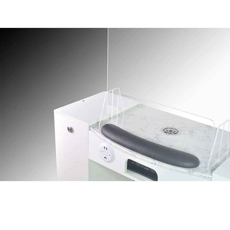 White sink with a black rubber mat on a gray background