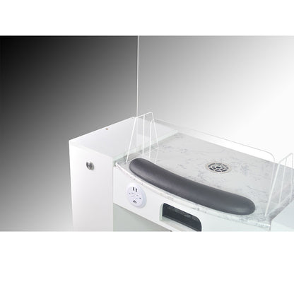 White sink with a black rubber mat on a gray background